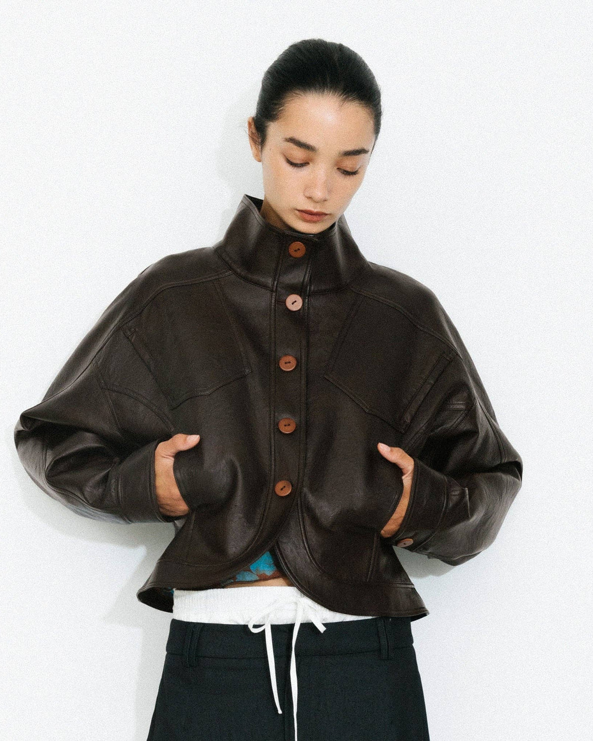 Curved Sleeve Faux Leather Jacket